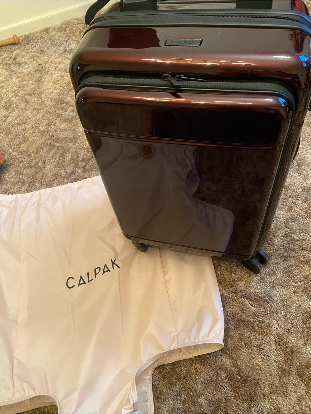 Calpak Carry-On Hardshell Luggage in Black Cherry Burgundy Gloss